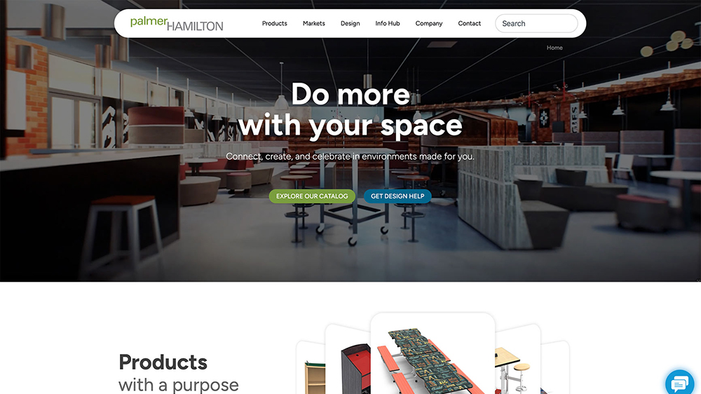 A modern, open-concept workspace with tables and seating is shown on a website homepage for Palmer Hamilton, featuring the slogan Do more with your space and two buttons: Explore Our Catalog and Get Design Help.